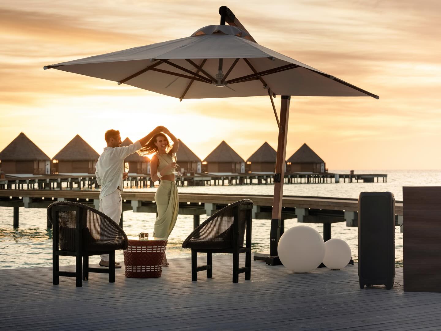 Photo by Mercure Maldives Kooddoo in Mercure Maldives Kooddoo Resort. May be an image of umbrella, deck chair, outdoors, cabana and text.