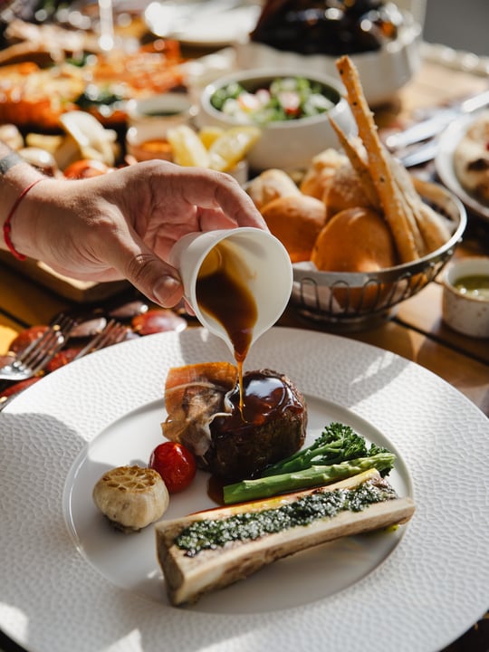 Photo by Kuredhivaru Resort and Spa on August 06, 2026. May be an image of ossobuco, steak, buffet and text.