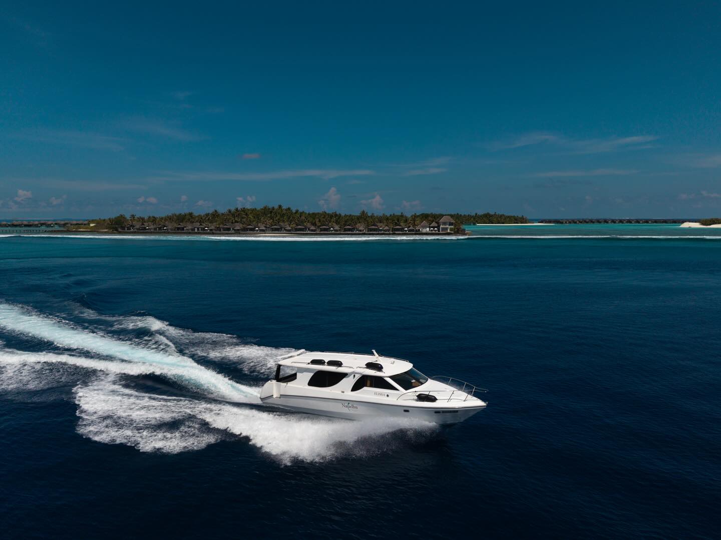 Photo by Naladhu Private Island Maldives on April 27, 2026. May be an image of jet ski, speedboat, yacht, horizon, ocean and text.