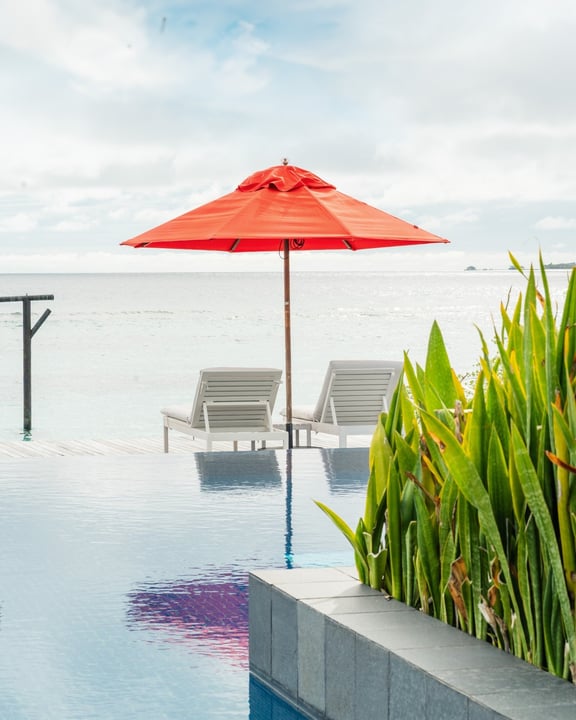 Cocktail in hand, the Indian Ocean just beyond the pool's edge. Some days need nothing more than this.

#NokuMaldives #VignetteCollection #IHG