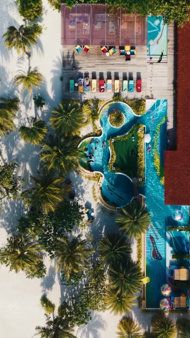 Somewhere between a canvas and a pool,
we decided it could be both.

Our mural pool is where art, colour, and island life come together.
Dive into the largest mural pool in the Maldives and see what i