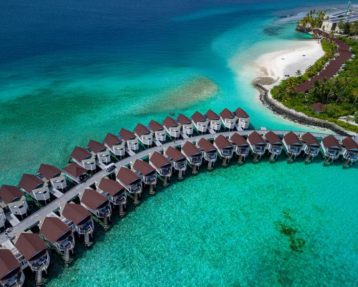 Photo by OBLU XPERIENCE Ailafushi on April 28, 2026. May be an image of body of water, cabana and text.