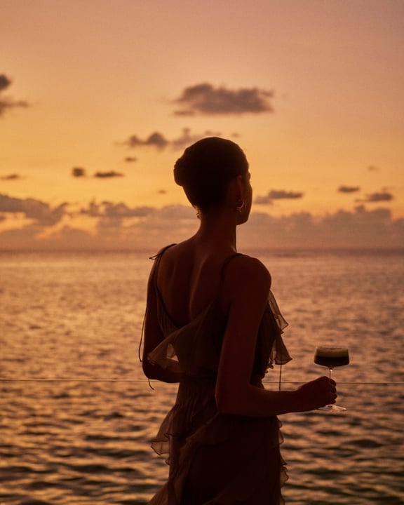 Photo by One&Only Reethi Rah on April 16, 2026. May be an image of ocean, twilight, horizon, water and text.