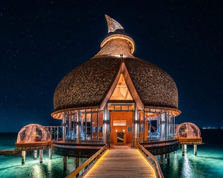 Photo by Outrigger Maldives Maafushivaru on July 25, 2026. May be an image of cabana, boathouse and text.