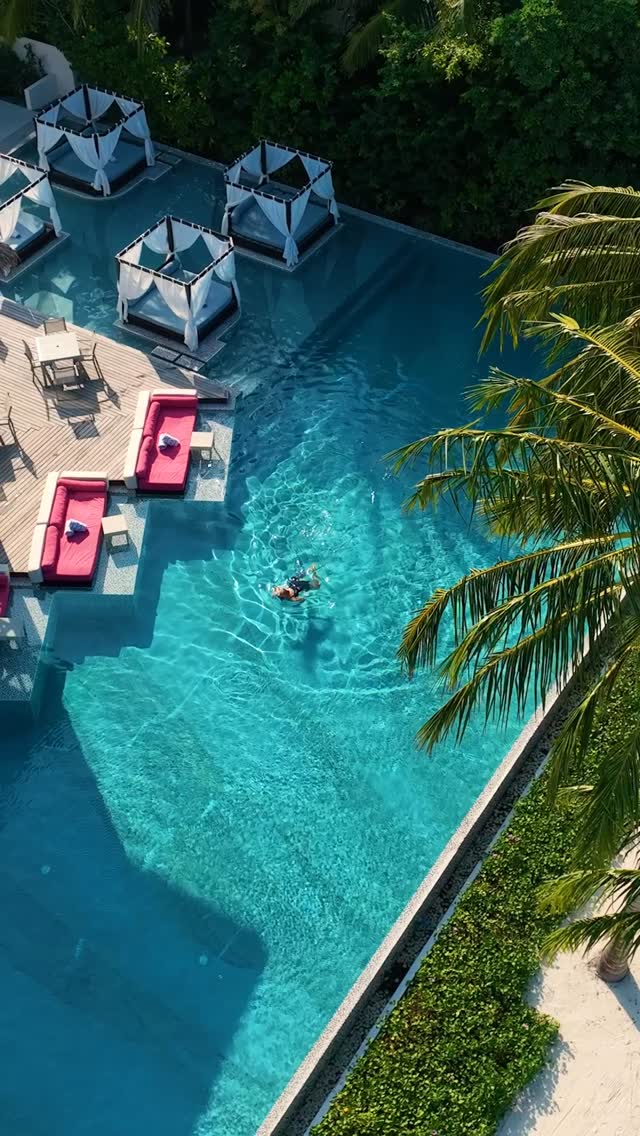 Imagine starting your day with a tranquil stroll by the pool, surrounded by the breathtaking beauty of the Maldives. Each step is a moment to savour, feeling the gentle breeze and soaking in the stunn