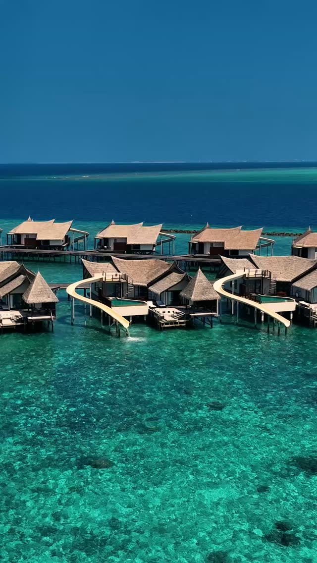 Imagine waking up here—where your private deck ends with a ocean slide into crystal-clear turquoise waters. This isn’t just a holiday; it’s summer redefined.⁠
⁠
Which bestie or partner are you draggin