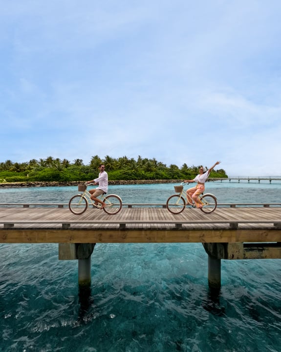 Photo shared by Mike & Maria | Our Life in Qatar on August 08, 2026 tagging @patinahotels, and @patinamaldives. May be an image of bicycle, water and text.