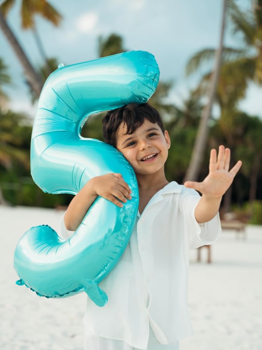 Photo shared by Ceyda Alp on June 06, 2026 tagging @pullman_maldives. May be an image of baby, beach ball, balloon, outdoors and text.
