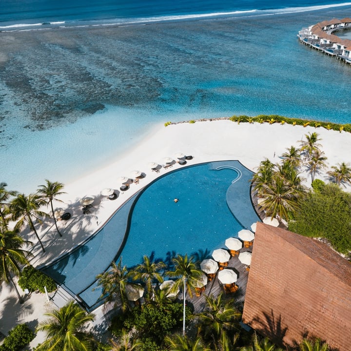Photo by Radisson Blu Resort Maldives in Radisson Blu Resort Maldives. May be an image of beach, cabana and text.