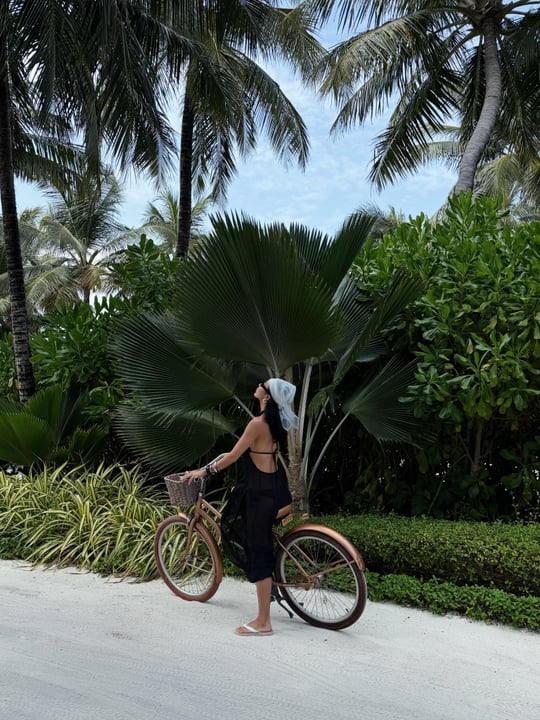 Photo by The Ritz-Carlton Maldives, Fari Islands on June 04, 2026. May be an image of bicycle, outdoors, palm trees and text.