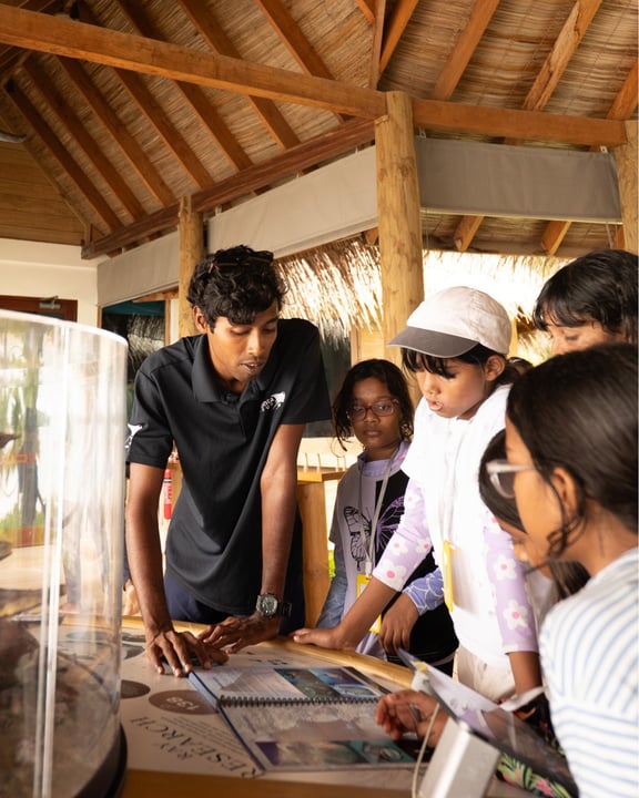 Photo by Six Senses Laamu on August 12, 2026. May be an image of one or more people, people studying and text.