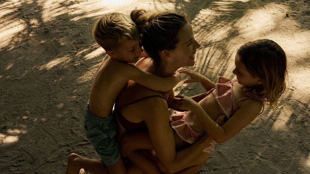 Photo by Soneva on June 08, 2026. May be an image of child, people kissing and text.