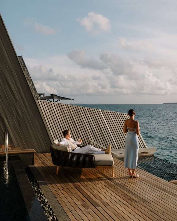 Photo by The St. Regis Maldives Vommuli Resort in The St. Regis Maldives Vommuli Resort. May be an image of deck chair, chaise longue, outdoors and text.