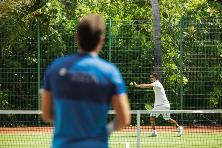 Photo by The Standard, Maldives on June 13, 2026. May be an image of tennis player, racket, sport equipment and text.