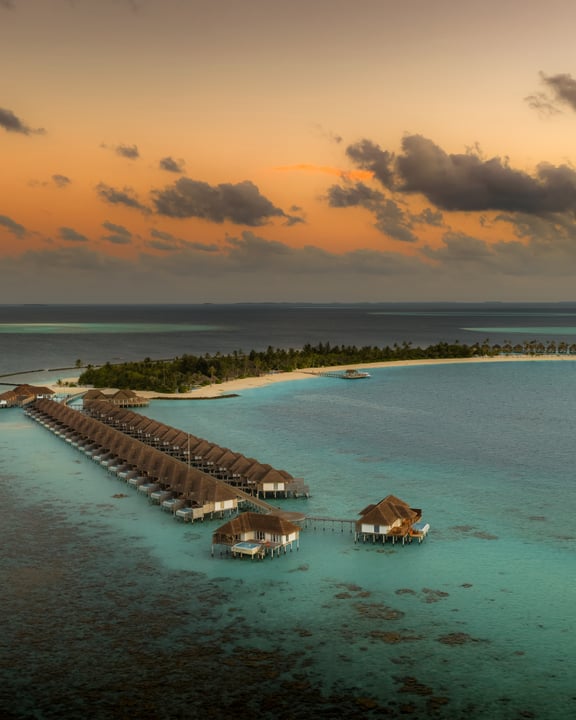 Foto von Iru Veli in Sun Siyam Iru Veli. Könnte ein Bild von einer Wasserfläche und Text sein.