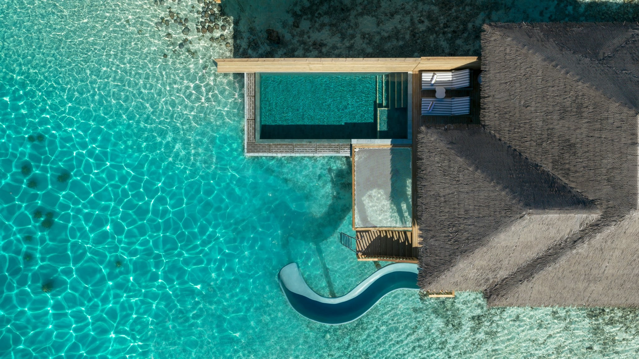 Ocean Signature Villa mit Pool + Rutsche im Sun Siyam Vilu Reef