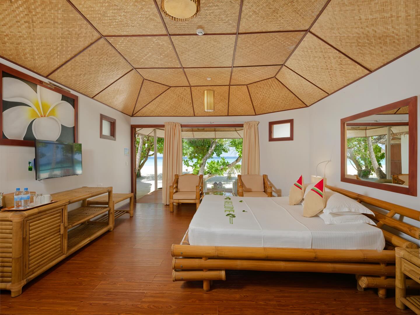 Photo by Thulhagiri island, Maldives in Maldives Thulhagiri Island. May be an image of bed, bamboo, bedroom and text.