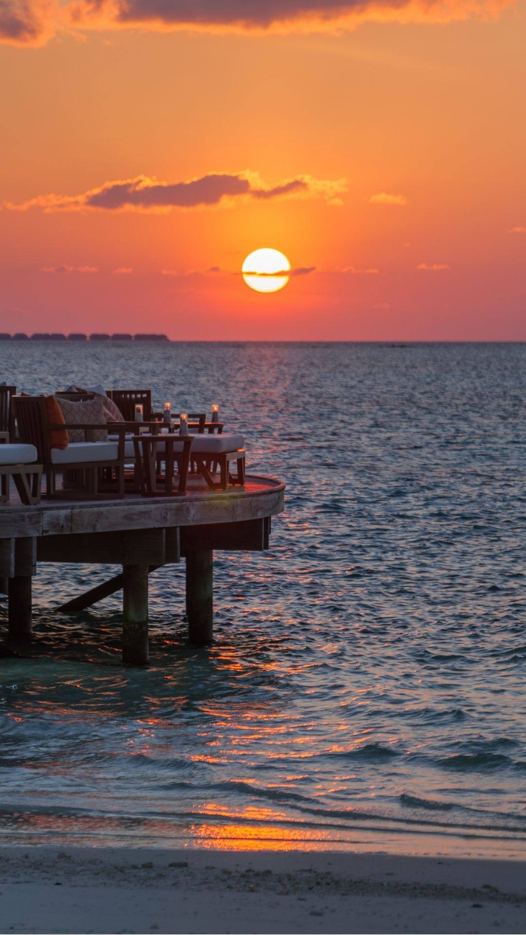 Foto von V Villas Maldives at Mirihi - MGallery Collection vom 02. September 2026. Könnte ein Bild von Dämmerung, Horizont, Ozean, Natur, Wasser und Text sein.