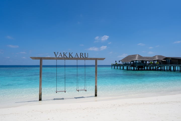 Photo shared by Vakkaru Maldives - Baa Atoll on June 17, 2026 tagging @theresortscollection. May be an image of beach, ocean, cabana and text that says "VAKKARU".