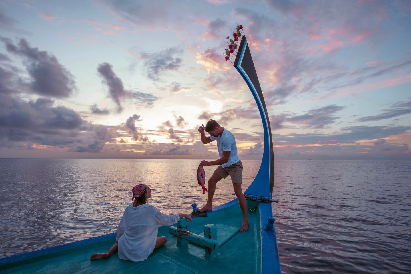 Photo by VARU by Atmosphere on June 13, 2026. May be an image of one or more people, boat, sail, yacht, twilight, ocean, water and text.