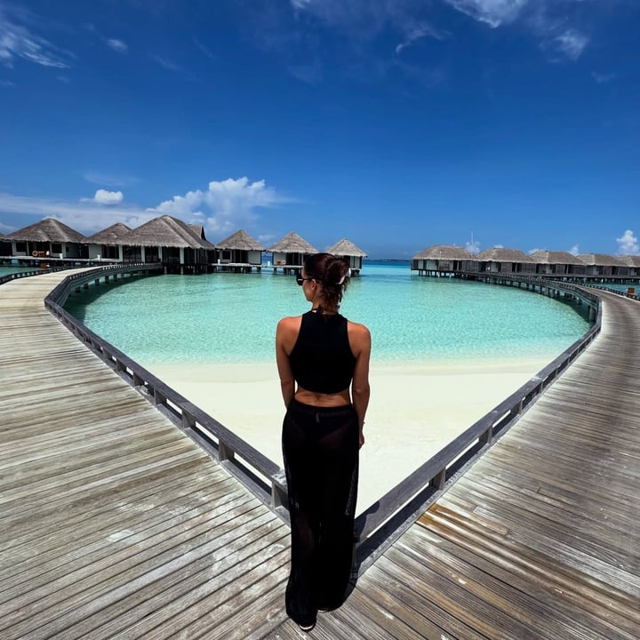 Photo by silviaschreibt in Niva Velassaru Maldives with @nivavelassarumaldives. May be an image of sarong and text.