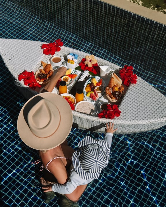 Photo by Villa Nautica, Maldives in Villa Nautica, Maldives. May be an image of towel, deck chair, pool, picnic and text.