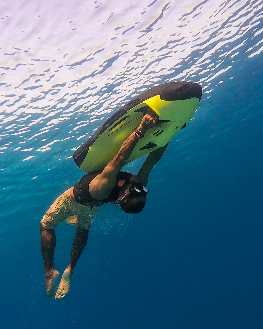 Photo by W Maldives on July 28, 2026. May be an image of swimming, surfboard, wetsuit, snorkel and text.
