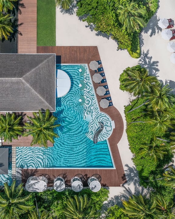 Photo by W Maldives on August 04, 2026. May be an image of pool, outdoors, cabana and text.