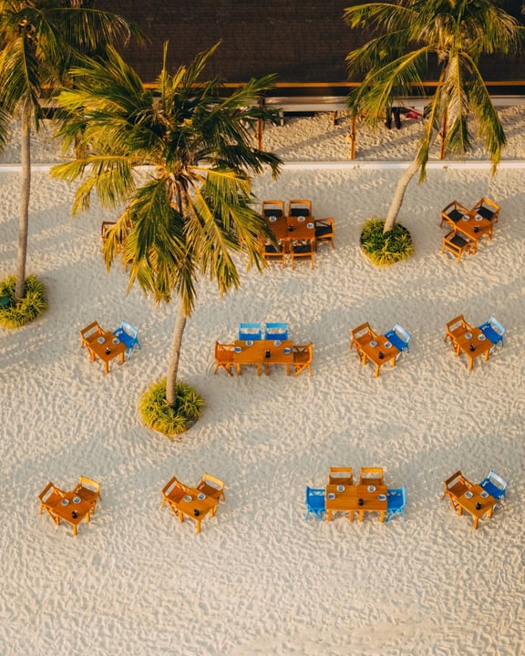 Photo by The Westin Maldives on June 16, 2026. May be an image of deck chair, chaise longue, palm trees and text.